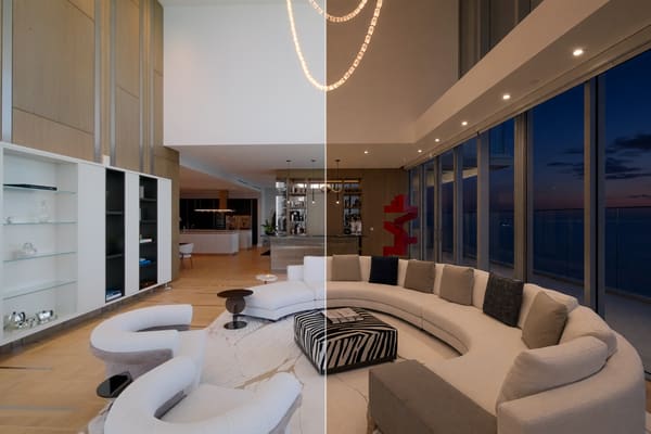 One living room split down the middle: daylight on the left, night with the lights on and clouds over the sea on the right